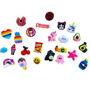 Set of (24) brand new croc charms!